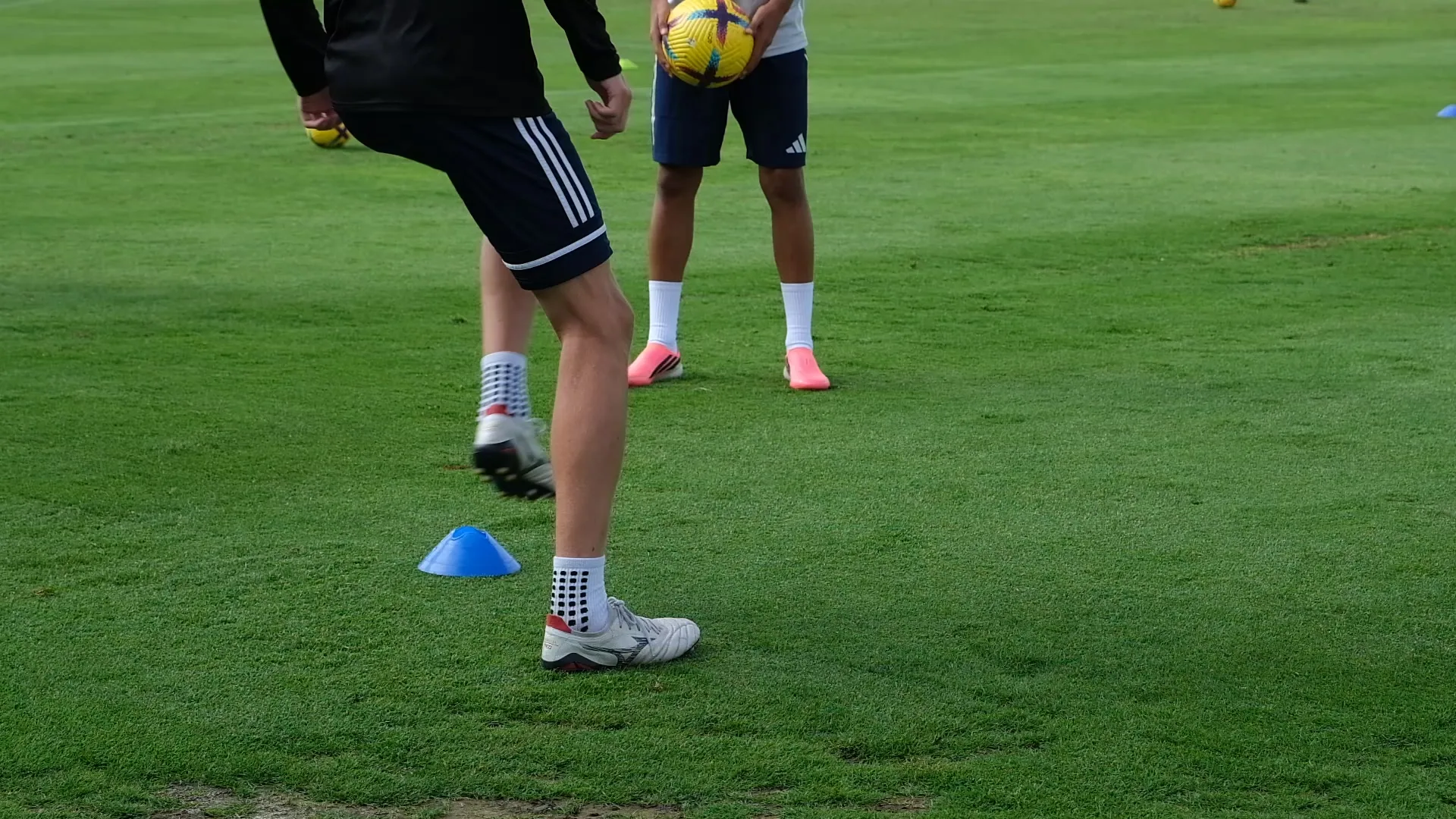 Close coaching during a technical training exercise